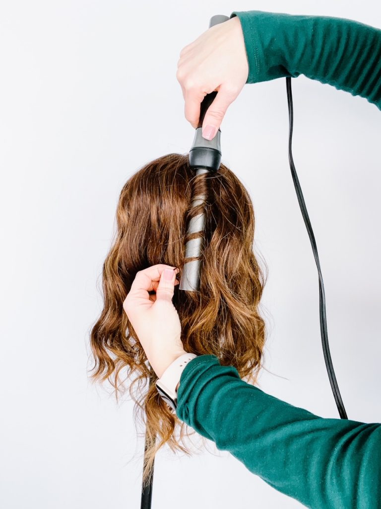 Keeping the wand perpendicular to the floor allows the curl a more relaxed look to it. 