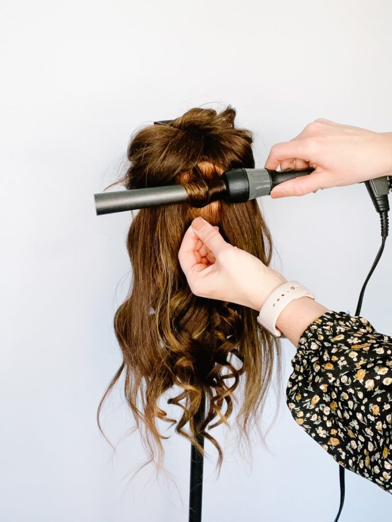 Have the wand parallel to the floor for a tighter, more bouncy curl 